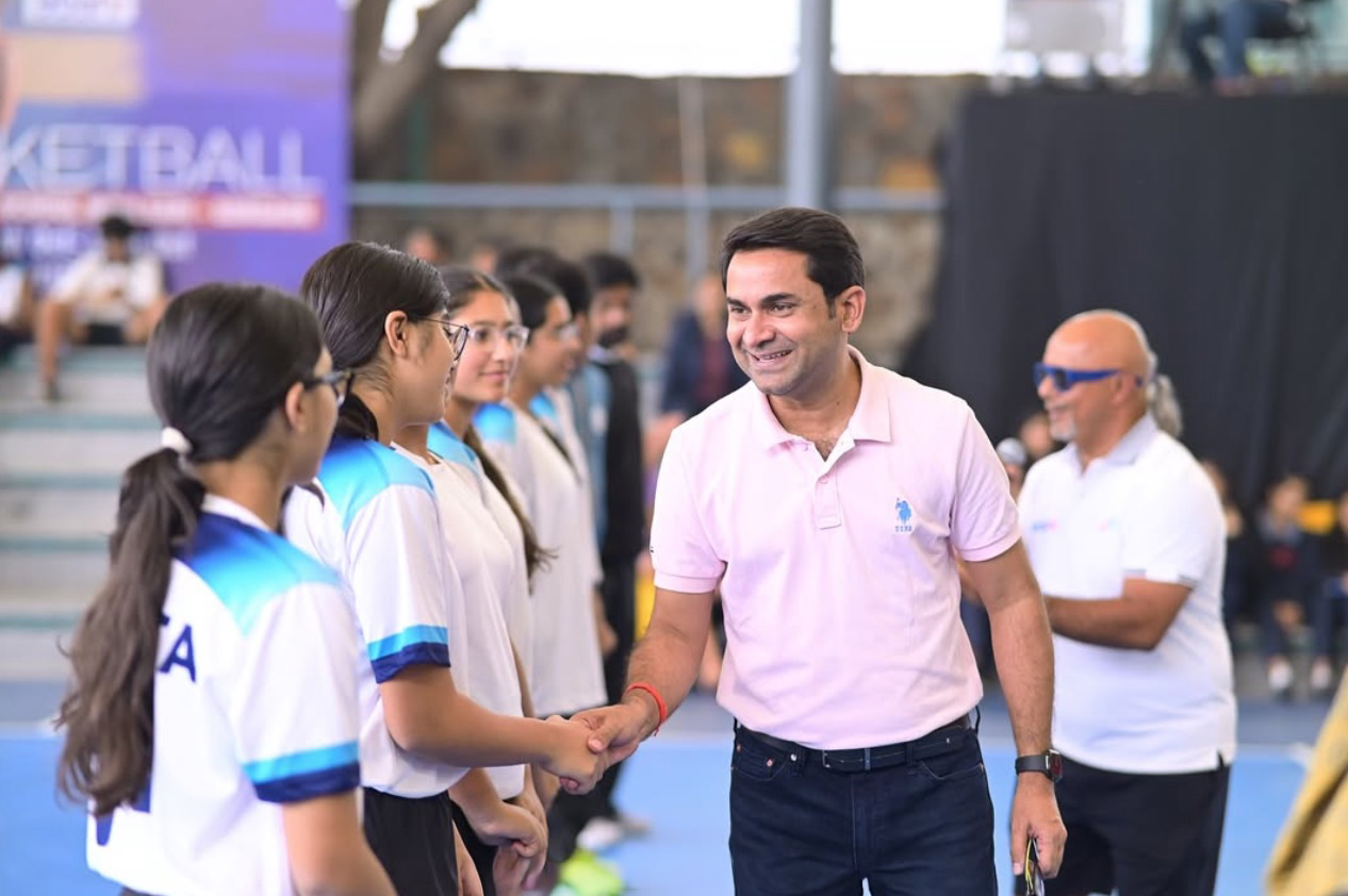 Basketball players on outdoor court